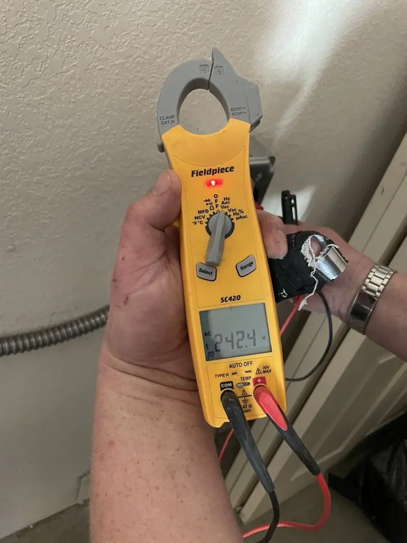 Voltage testing with clamp meter during Whole House Surge Protector in East Drumore